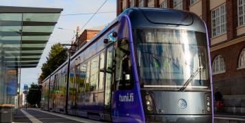 Tram running in the street of Tampere