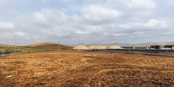 A Biomethane plant in Sicily, with citrus fruit waste in the foreground. 