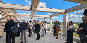 People observing renovation object