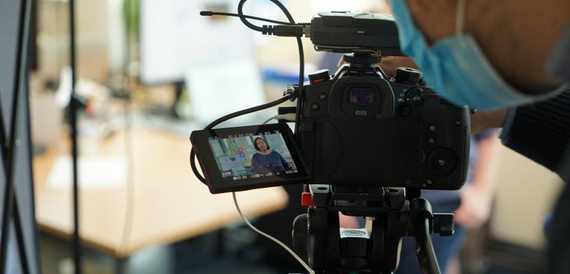 Behind the camera shot of Interreg Europe staff member